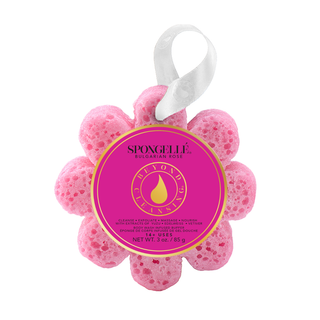 A pink flower-shaped bath bomb with a white hanging ribbon and a circular pink label reading 'SPONGELLÉ Bulgarian Rose' on a plain white background.