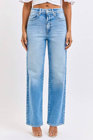 Light blue jeans worn by a person on a white background