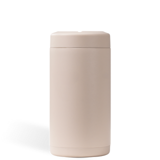 Beige cylindrical container with lid on a white background