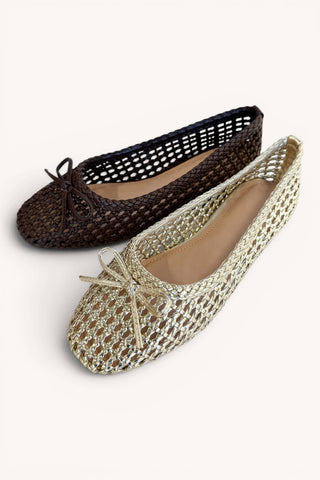 Two woven crochet flat shoes with bow details, shown on a light beige background. One shoe is dark brown and the other is light gold/beige.