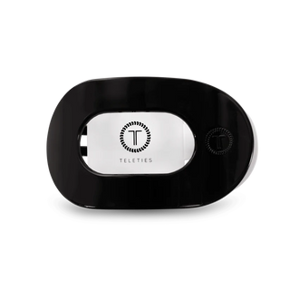 Black flat hair clip with teleties logo on a white backgroundBlack flat hair clip with teleties logo on a white background