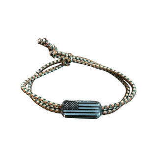 Bracelet with American flag charm on a white background