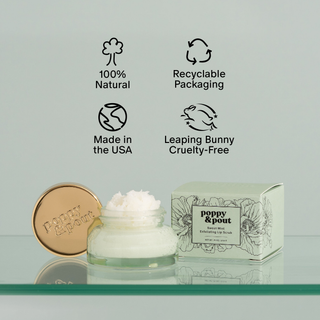 Poppy & Pout lip scrub with packaging and certification icons on a light gray background