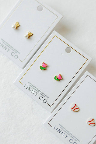 Floral-themed earrings on LINNY CO branded cards with a white background