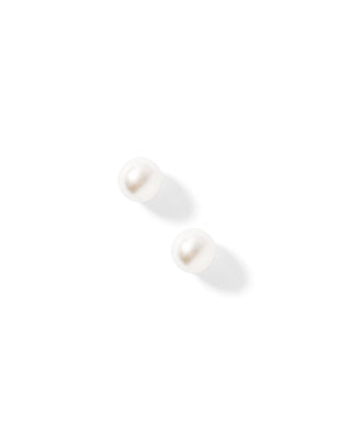 Two white cylindrical objects on a white background