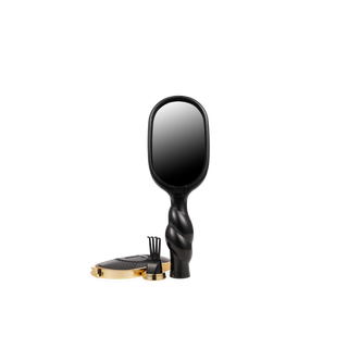 Black and gold mirror on a white background