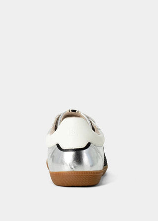 Silver sneaker with a brown sole on a white background