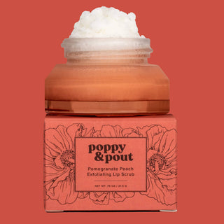 Jar of Poppy & Pout lip scrub with floral design on a red background