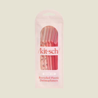 Packaging of 'kit-sch' recycled plastic dermaplaners on a light gray background