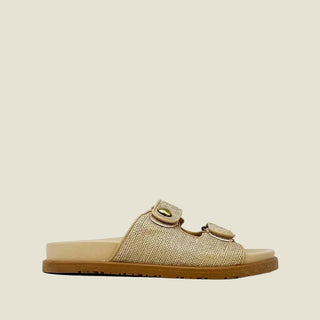 Beige sandal with a brown sole on a white background