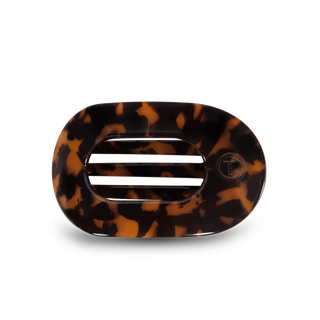 Tortoiseshell patterned hair clip on a white background
