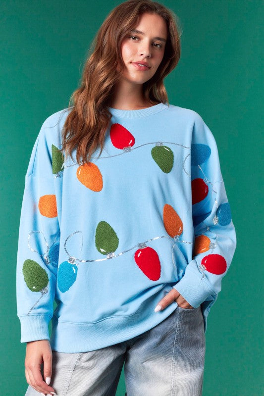 Let It Glow Sweatshirt