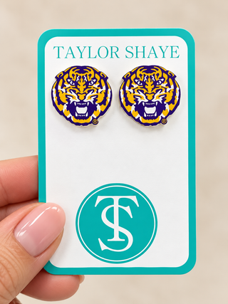 LSU stud earrings on a Taylor shaye card and tan background