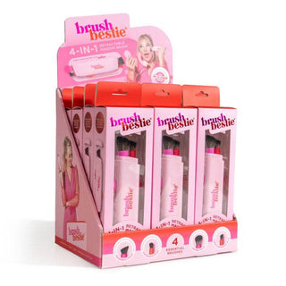 A retail display stand holding four boxed brush bestie 4-in-1 essential makeup brushes, shown on a clean white background.