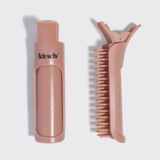 Pink hairbrush and case with 'kitsch' branding on a light gray background