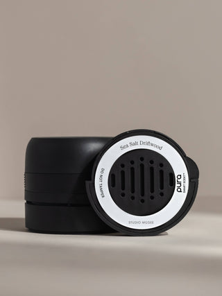 Black and white device with 'Puro' branding on a beige background