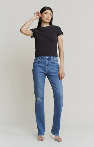 The Collins Straight Leg jeans in Mica wash on model