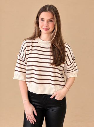 Collins striped half sleeve sweater with exposed seams on model