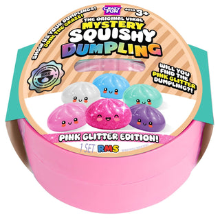Pink glitter edition Mystery Squishy Dumpling toy packaging with colorful text and dumplings illustration.