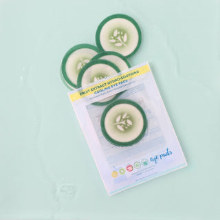 Cucumber slices in a packaging on a light green background