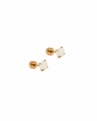 Gold heart-shaped earrings on a white background