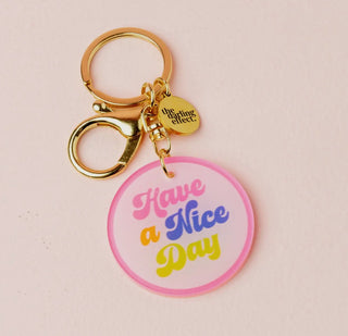 The Darling Effect key chain with pink Have a Nice Day tag