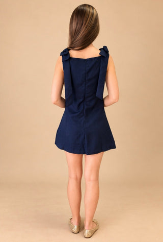 Evelyn textured sleeveless mini dress with bow shoulder detail on model, view 3