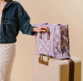 The Everyday Quilted Tote Bag in Bouquet Beauty Purple carried by model
