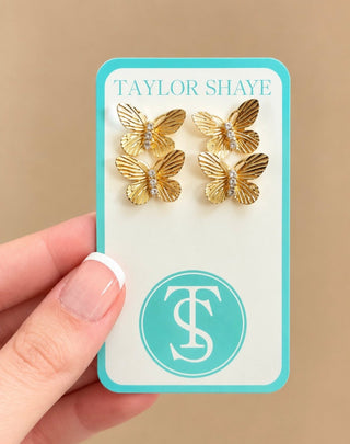 Flutter gold butterfly stud earrings with crystal accents