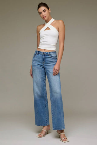 Hidden Mid Rise Dad Jeans on model with a white halter top