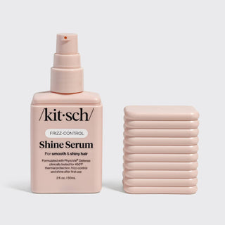 Kit'sch Shine Serum bottle with packaging on a light gray background
