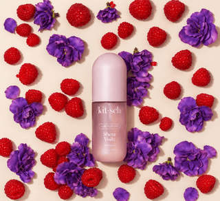 Kitsch Sheer Violet hair perfume in pale pink bottle with raspberries and violets