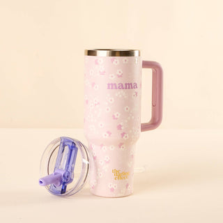 Pink floral-patterned tumbler with 'mama' text on a beige background