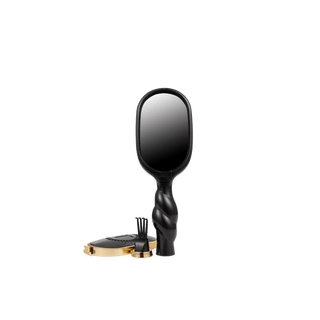 Black and gold mirror on a white background