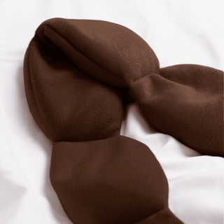 Brown fabric with a textured pattern on a white background