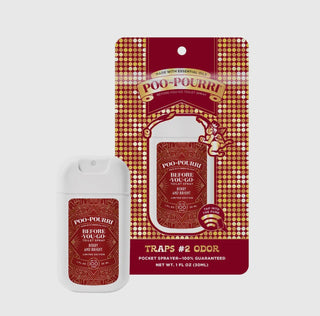 Holiday Poo~Pourri spray in red and gold holiday packaging