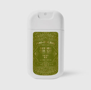Holiday Poo~Pourri spray with green label