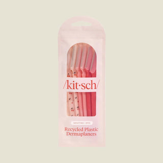 Packaging of 'kit-sch' recycled plastic dermaplaners on a light gray background