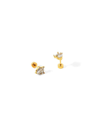 Gold earrings with gemstones on a white background