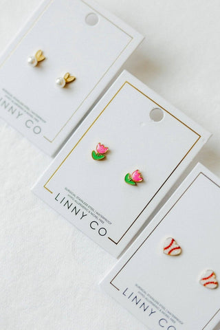 Floral-themed earrings on LINNY CO branded cards with a white background