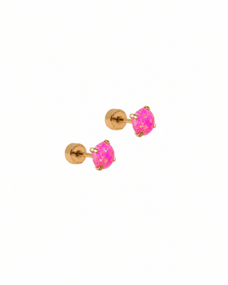 Pair of gold stud earrings with pink gemstones on a white background