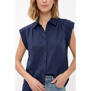 Relaxed sleeveless collared button-up blouse with subtle shimmer, view 3