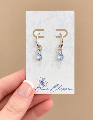 Sky drop earrings with icy blue faceted stones