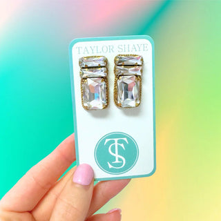 Taylor Shaye Crystal Gem Studs held in hand