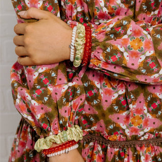 Berry Cozy Mix Pack hair ties styled on the wrist