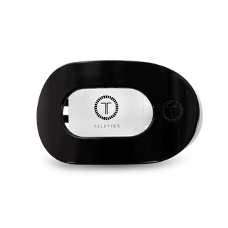 Black flat hair clip with teleties logo on a white backgroundBlack flat hair clip with teleties logo on a white background