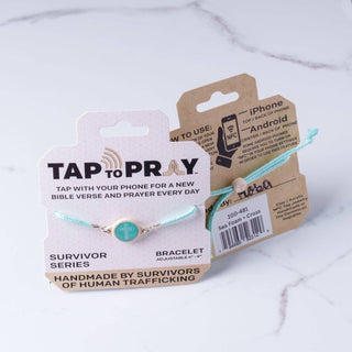 Turquoise bracelet with 'Tap to Pray' packaging on a white background