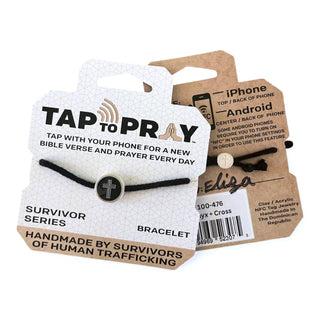 Black bracelet with cross charm on a branded card and packaging.