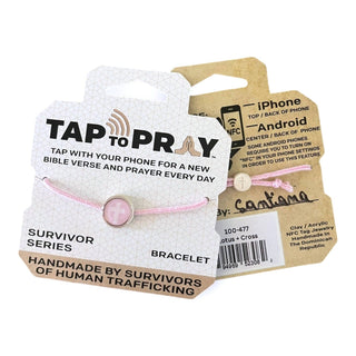 Pink bracelet with 'Tap to Pray' packaging on a white background
