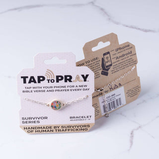 Bracelet with 'Tap to Pray' feature on a white background